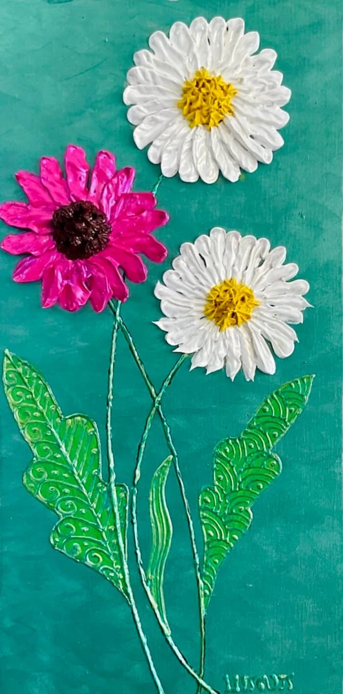 Textured mixed media floral artwork featuring cerise and white daisies with green leaves against a teal background.