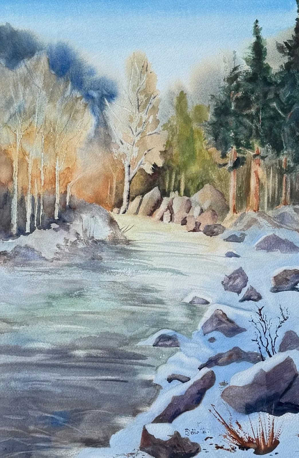 An impressionistic watercolor painting depicts a winter landscape with a river flowing past snow-covered rocks and trees.