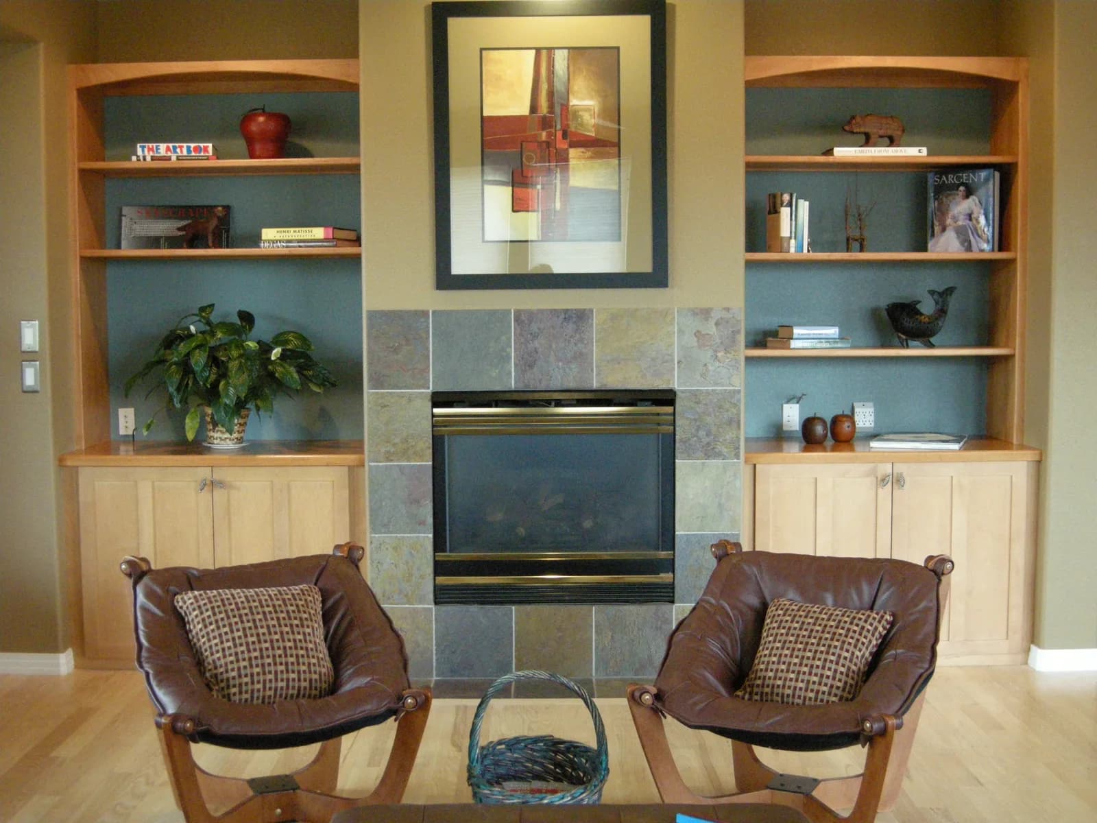 An abstract geometric painting in oil and acrylic features bold lines and blocks of color in shades of Indian Khaki and Dallas.