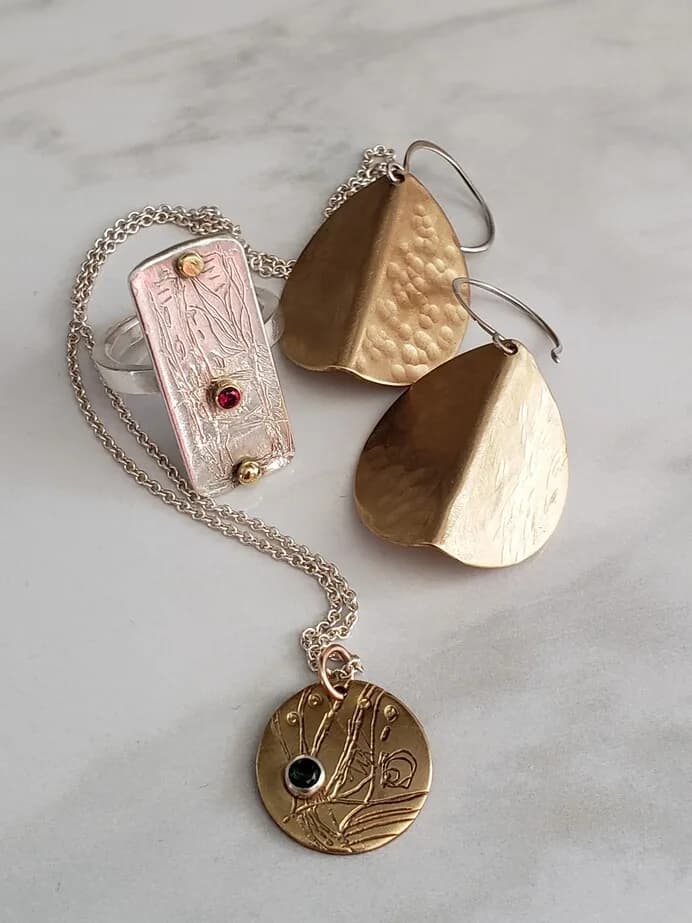 Hidden artwork image, ruby-ring-brass-necklace-earrings by Elizabeth Woody