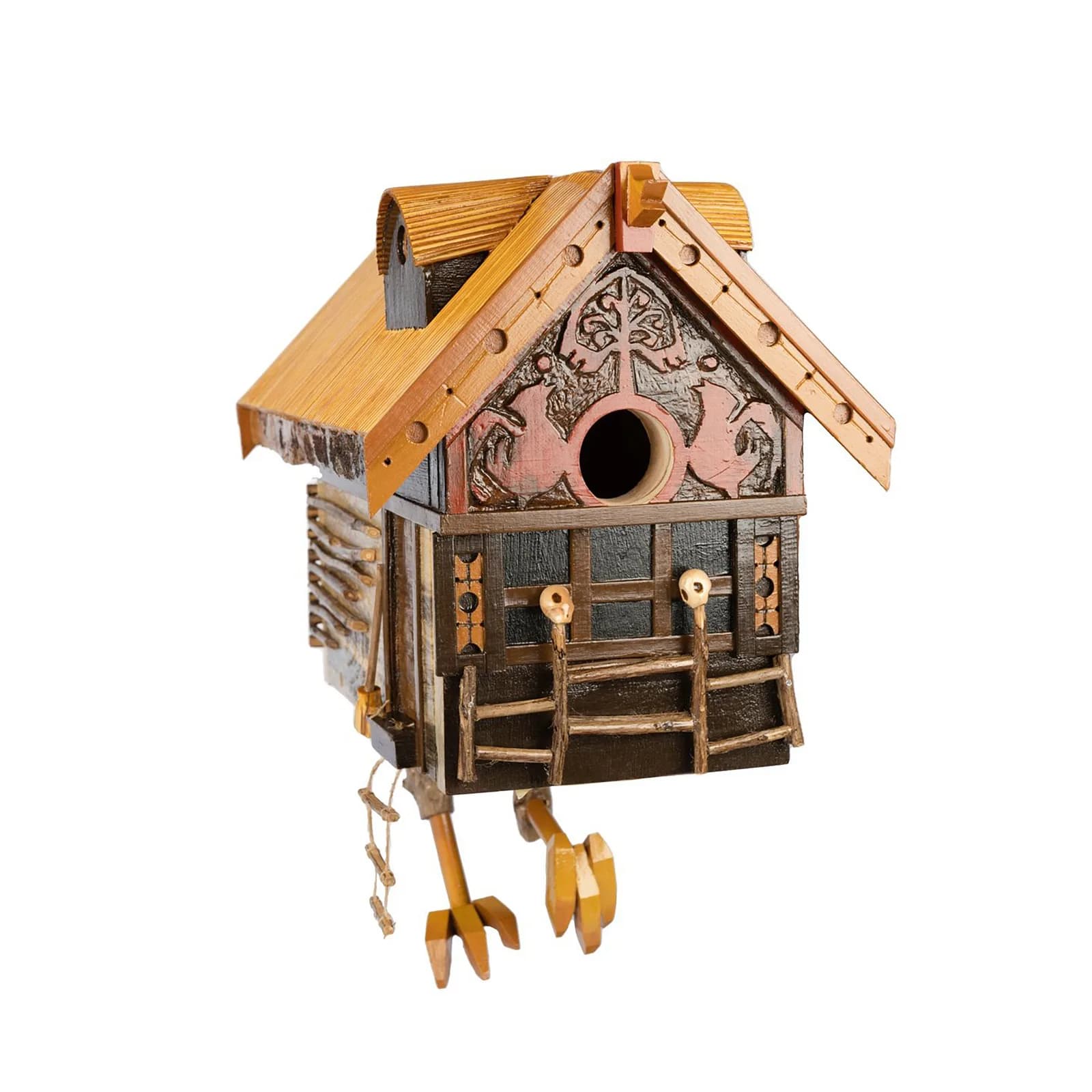 A whimsical folk art wooden birdhouse with intricate carvings and a unique design.