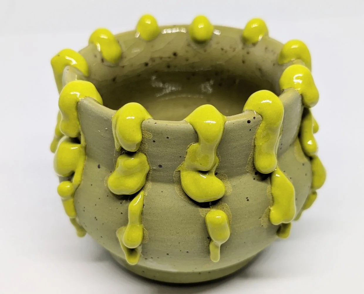 Featured artwork by Julie BaBulie Ceramics