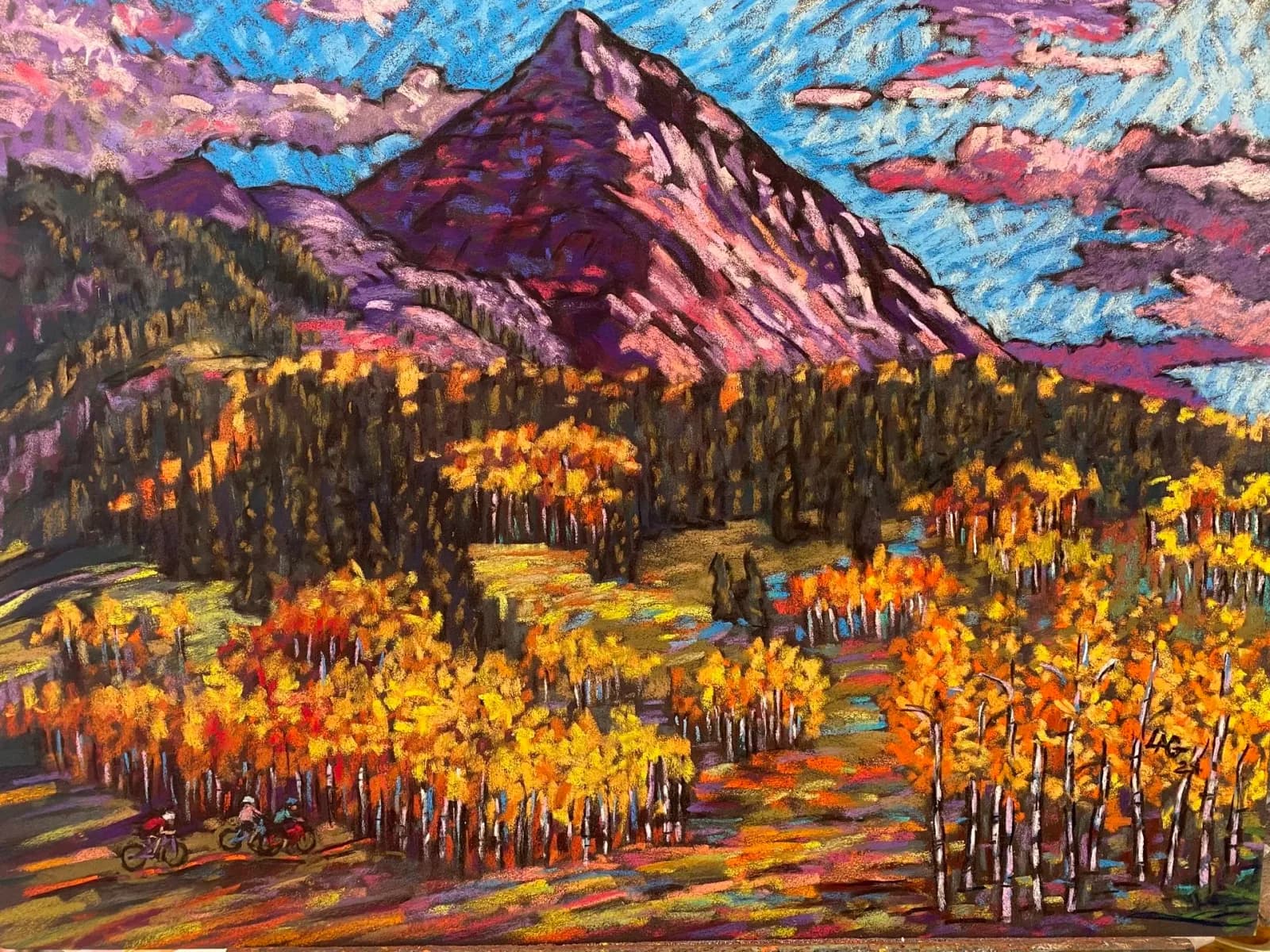 A vibrant pastel landscape depicts a mountain scene with fall foliage and cyclists on a trail.