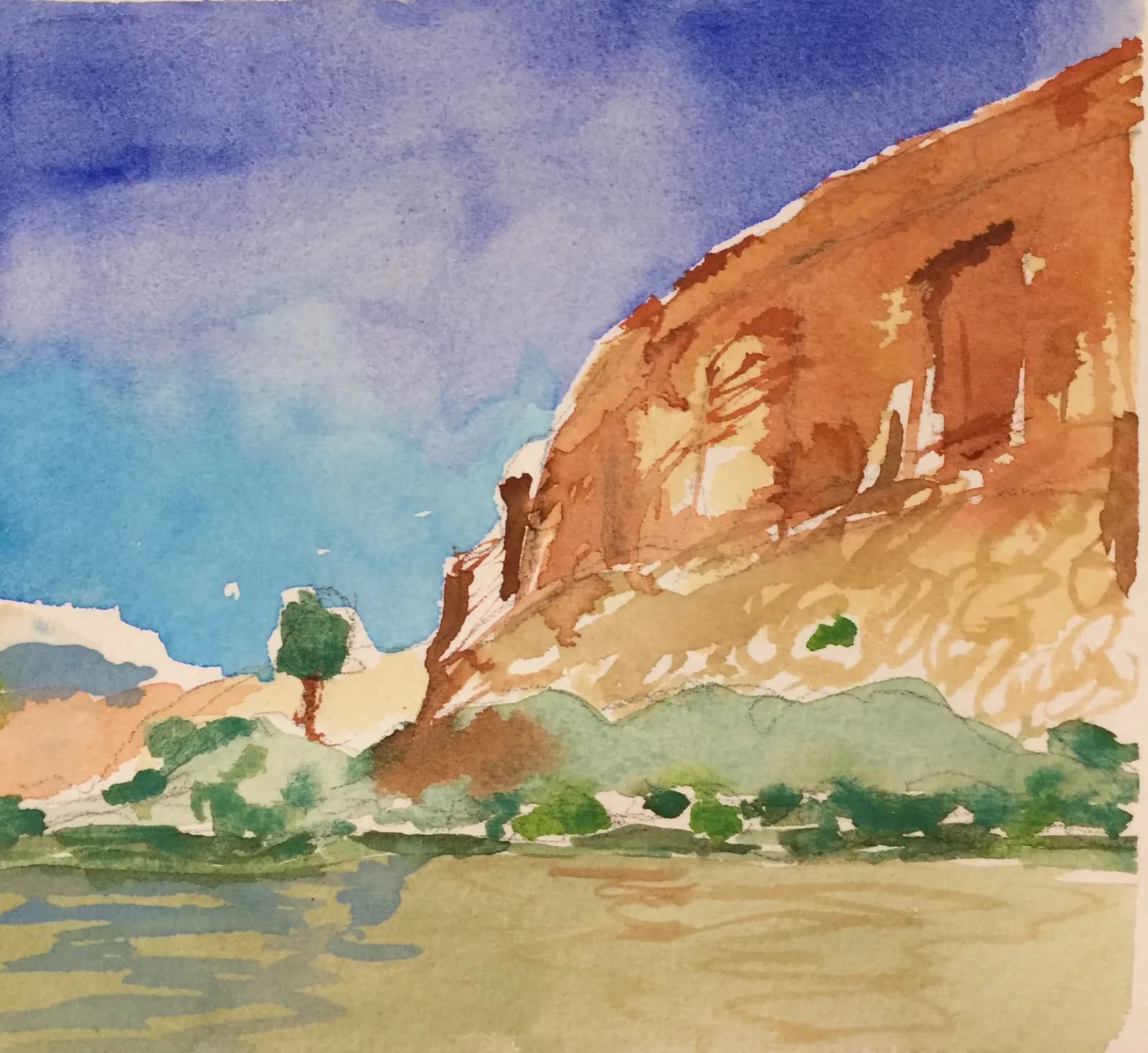 An impressionistic watercolor painting depicts a rocky landscape with a body of water under a blue sky.