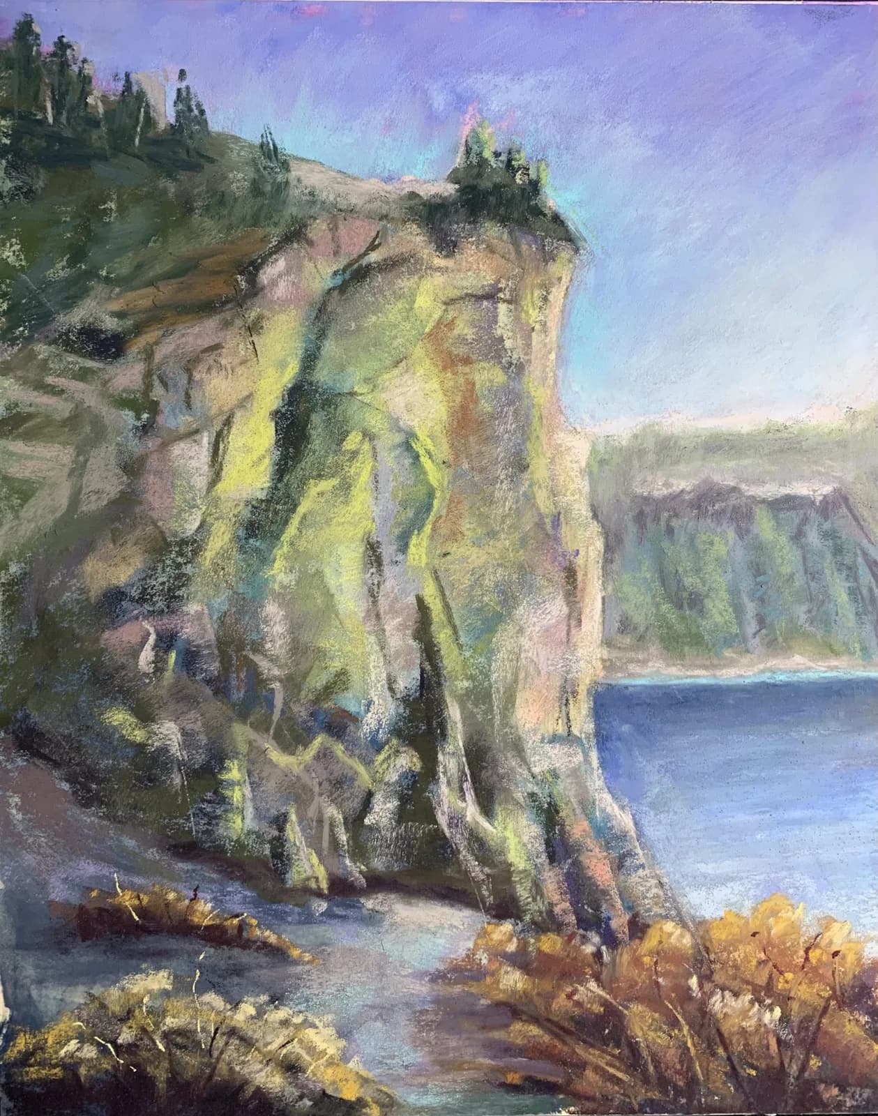 An impressionistic pastel landscape depicts dramatic cliffs overlooking a body of water with autumn foliage in the foreground.
