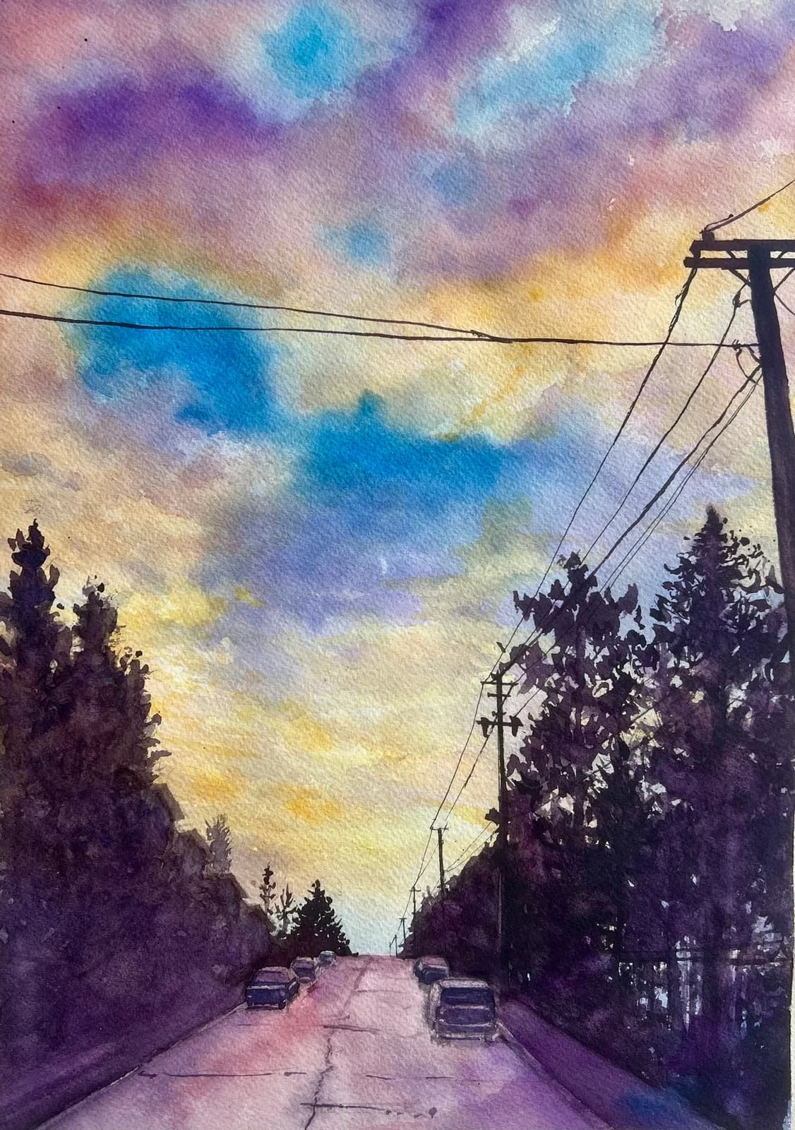A watercolor painting depicts a road leading uphill under a dramatic sky with clouds in shades of purple, blue, and yellow.