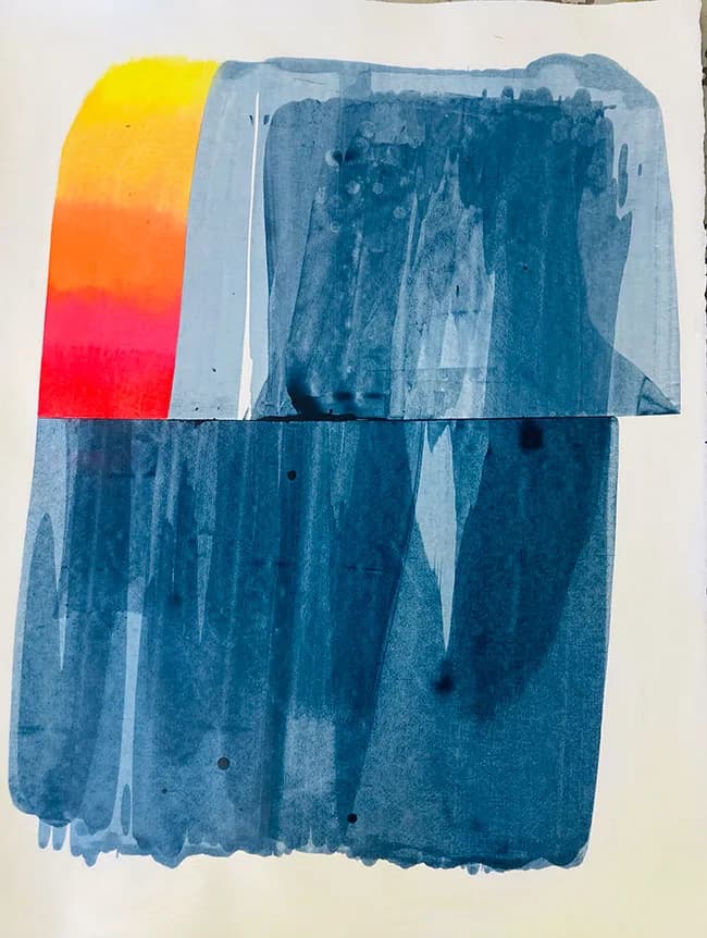 An abstract watercolor painting features bold washes of blue and a vibrant gradient of red, orange, and yellow.
