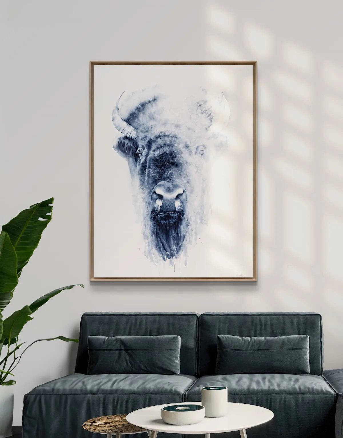 A watercolor painting of a bison's face in shades of blue, rendered with expressive brushstrokes.