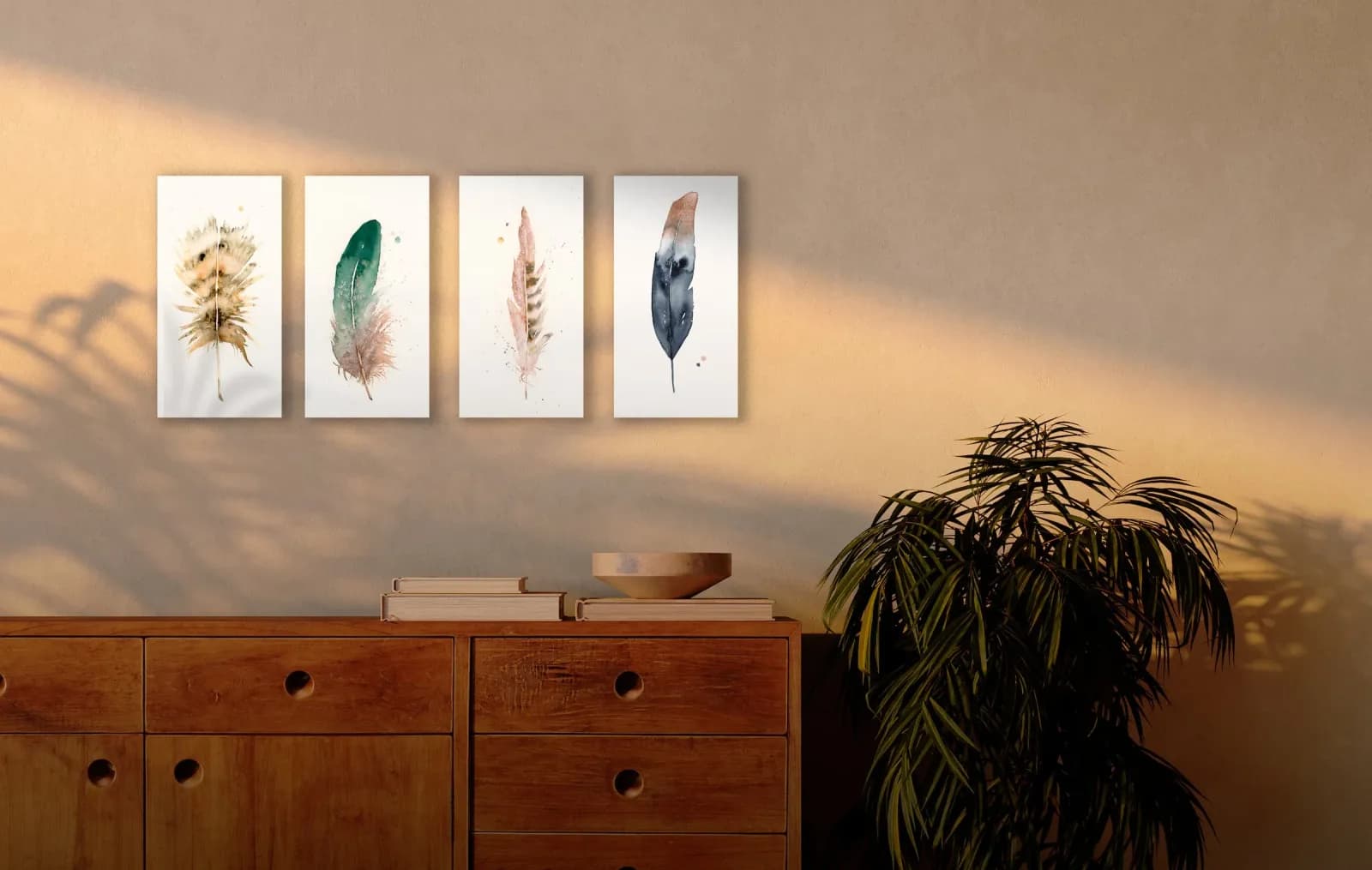 Four watercolor paintings of feathers in shades of brown, green, pink, and blue.